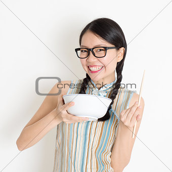 Asian Chinese girl eating