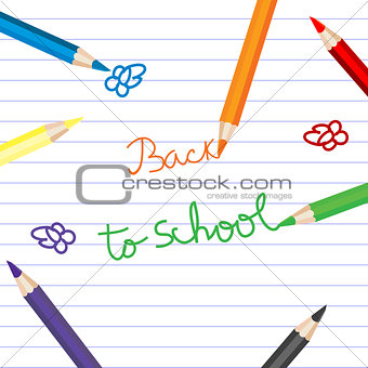 Back to school with colored pencils over notebook paper