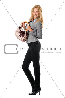 Cheerful young blonde with a handbag. Isolated