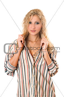 Sexy young blonde in a striped men's shirt
