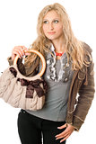 Portrait of lovely young blonde with a handbag