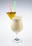 Milkshake with pineapple over white background