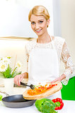 Young woman cooking. Healthy Food. Dieting Concept. Healthy Life