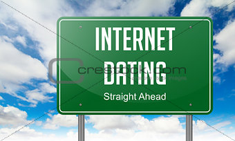 Internet Dating on Green Highway Signpost.