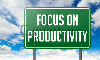Focus on Productivity - Green Highway Signpost.