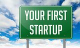 Your First Startup on Green Highway Signpost.