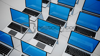 3d image of a lot of laptops in a rows.