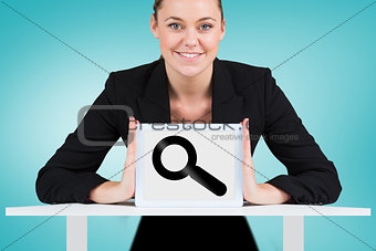 Composite image of businesswoman showing tablet pc
