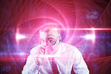 Composite image of focused businessman with magnifying glasses