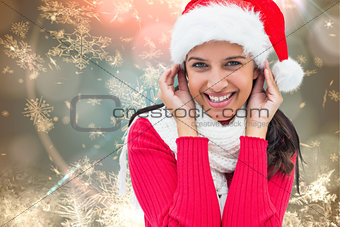 Composite image of festive brunette