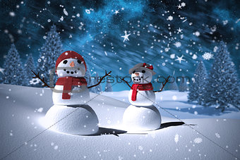 Composite image of snowman family