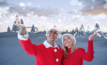 Composite image of festive couple
