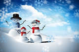 Composite image of snow man family
