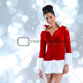 Composite image of pretty santa girl smiling at camera