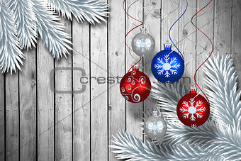 Composite image of digital hanging christmas bauble decoration