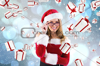 Composite image of sexy santa girl wearing spectacles