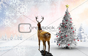 Composite image of christmas tree and reindeer