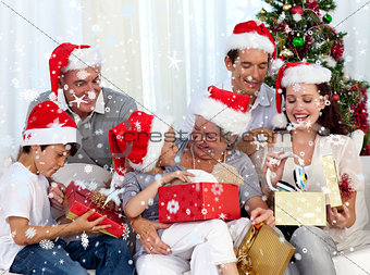 Composite image of family opening christmas presents at home