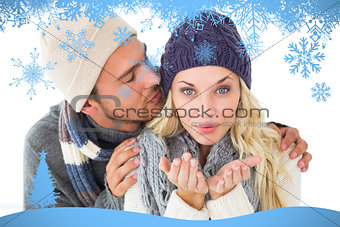 Composite image of attractive couple in winter fashion