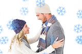 Composite image of attractive couple in winter fashion hugging