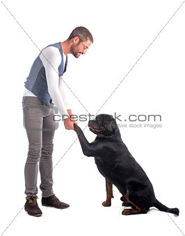 man and rottweiler