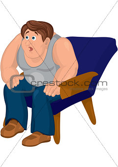 Cartoon man in gray top sitting in blue armchair with open mouth