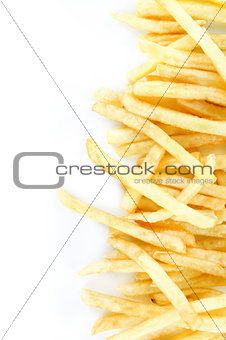 pile of appetizing french fries on a white background