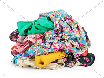 Big heap of colorful clothes,  isolated on white background.