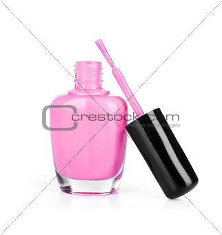 pink nail polish with brush on an isolated white background