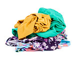 Big heap of colorful clothes, isolated on white background.