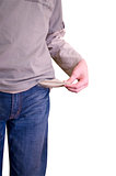 businessman standing isolated on the white background and showing his empty pocket, turning his pocket inside out, no money