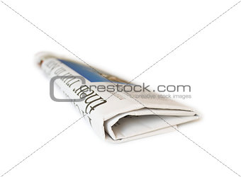 newspaper with news closeup on white background
