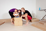 Young Family with a Baby  Moving 