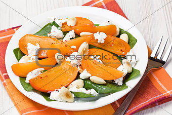 Spinach persimmon goat cheese salad
