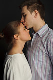 Photo of an attractive young couple in studio