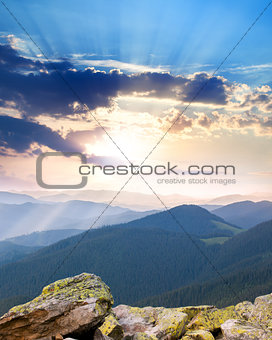 majestic Sunrise over the mountains  with sunbeams - vertical