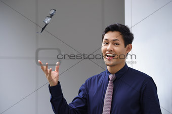 asian business man throwing eyeglasses glasses eyesight