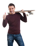 Happy smiling man holding longboard in his hand