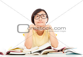 young student girl thinking with book over white background