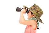 Little girl looking through binoculars. isolated on white