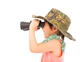 Little girl looking through binoculars. isolated on white