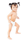 cute baby girl in a diaper making a funny pose.