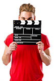Holding a clapboard