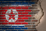 Dark brick wall with plaster - North Korea