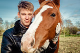 Man and horse outdoors