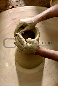 Potters Hands with Clay
