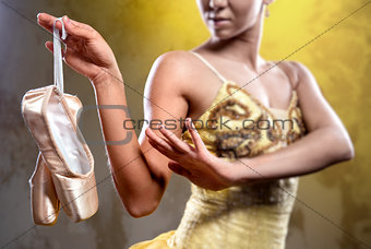 Ballerina with pointe shoes, selective focus