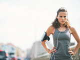 Portrait of fitness young woman in the city