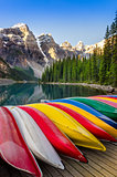 Landscape view of Moraine lake with colorful boats, Rocky Mounta