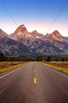 Scenic view of Grand Teton mountain range and road
